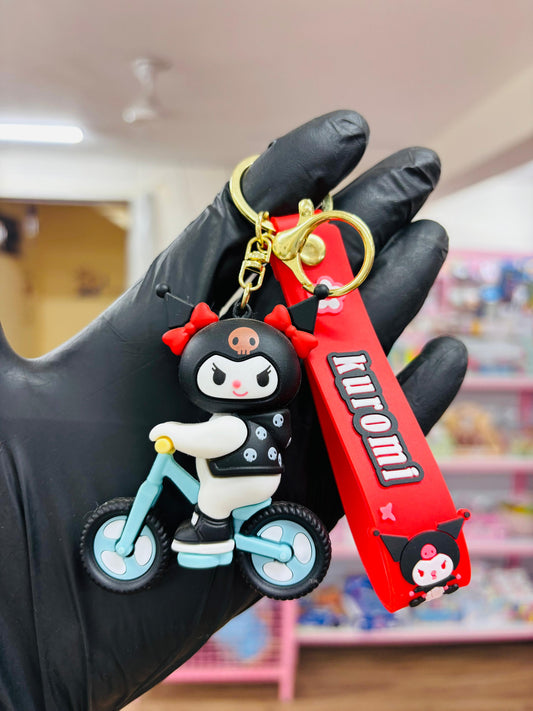 Kuromi On Cycle Black rubber keychain