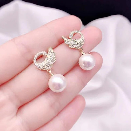 Swan pearl earrings